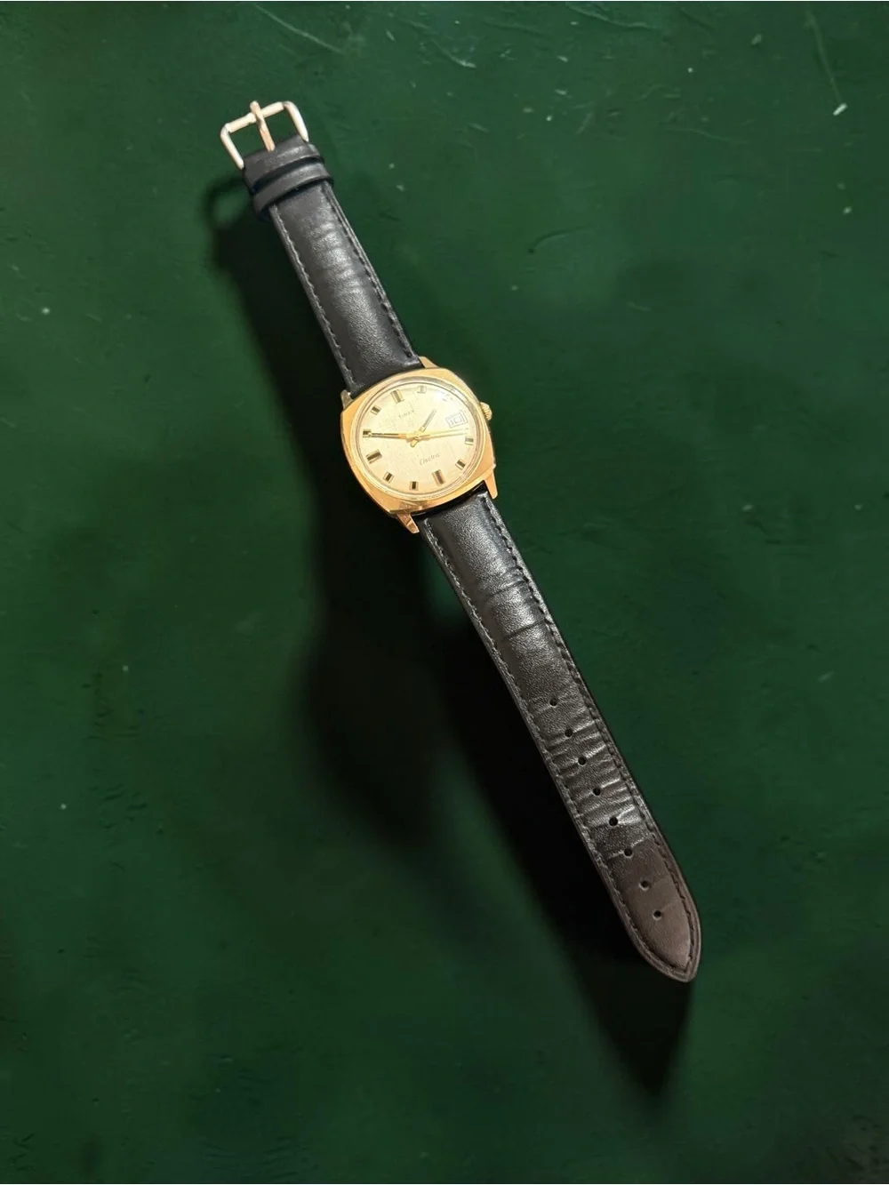 Vintage Timex Gold-Tone cushion Case with Champagne Dial and Black Leather Strap